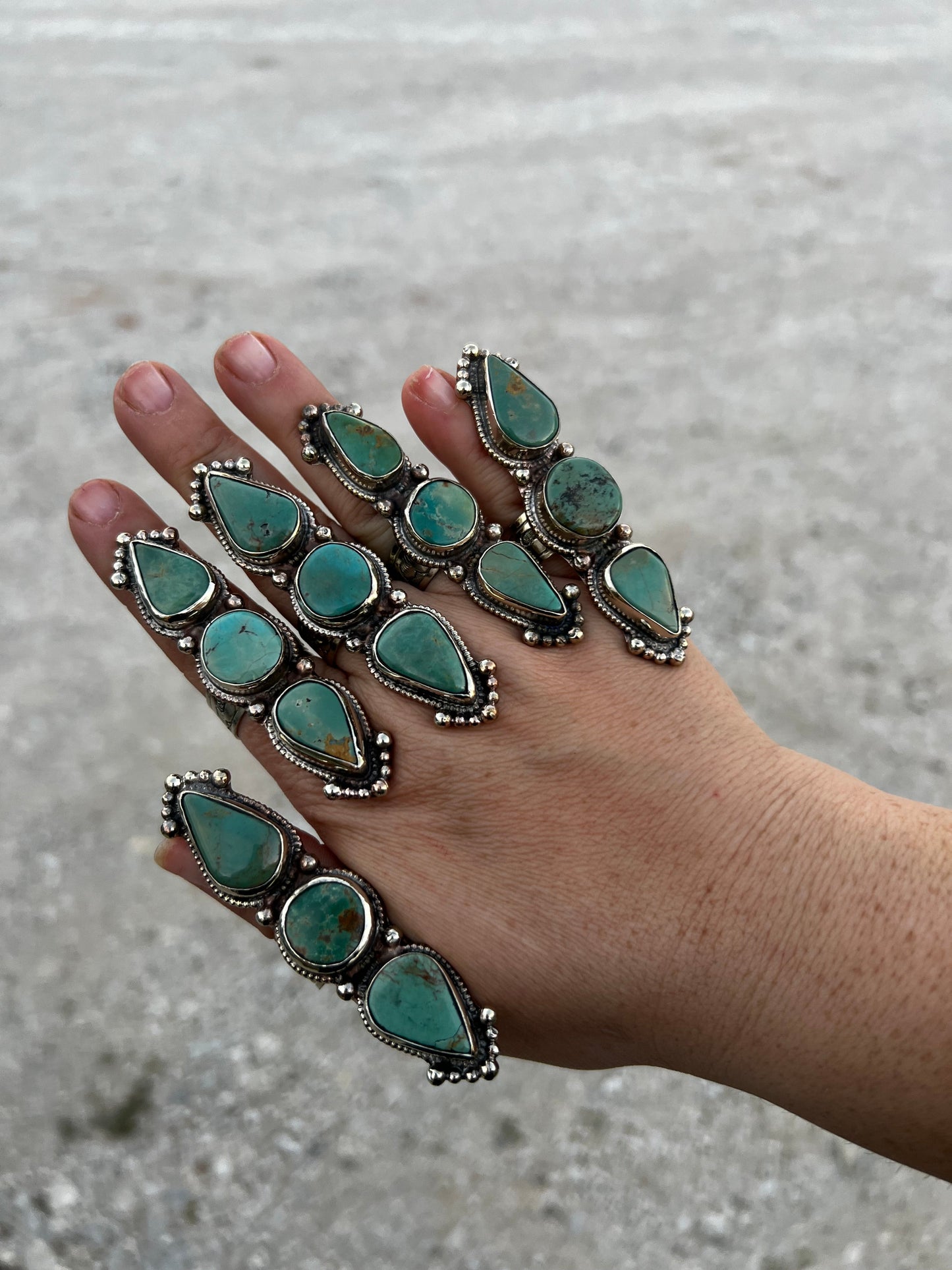 Long adjustable turquoise rings on brass silver